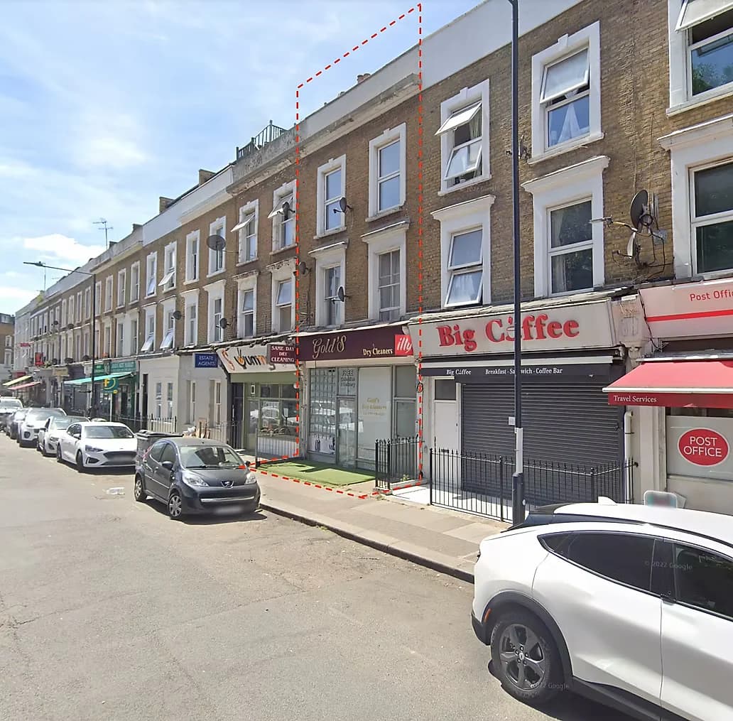 Street photograph of the existing parade with the site outlined in red